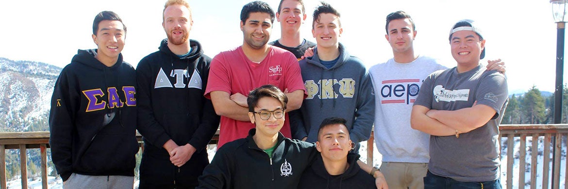Members of organizations associated with the Interfraternity Council pose during a winter retreat.