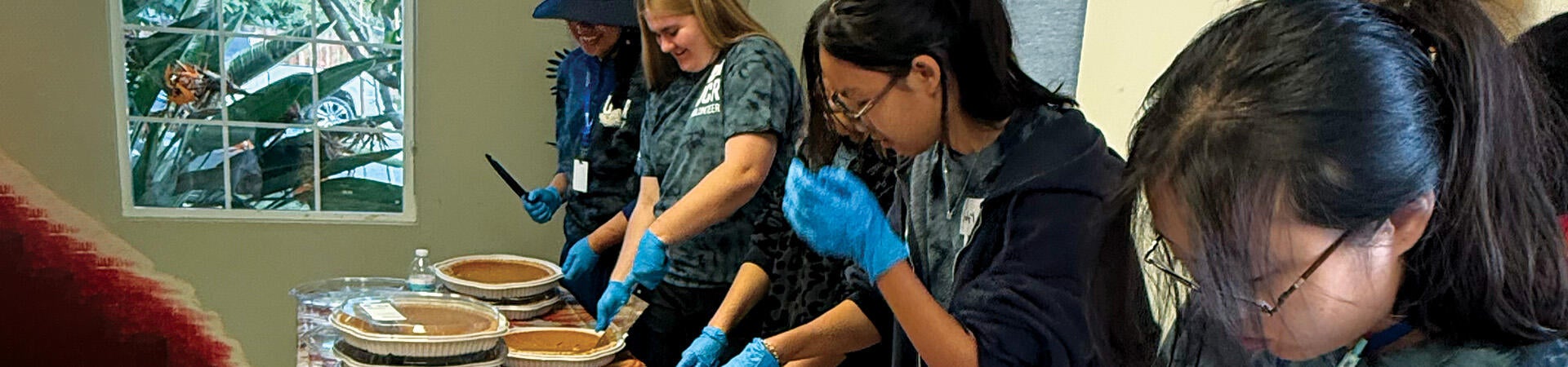 Slicing Pies at Highlanders Give Back 2025