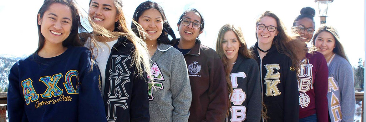 Members of organizations associated with the College Panhellenic Association pose during a winter retreat.