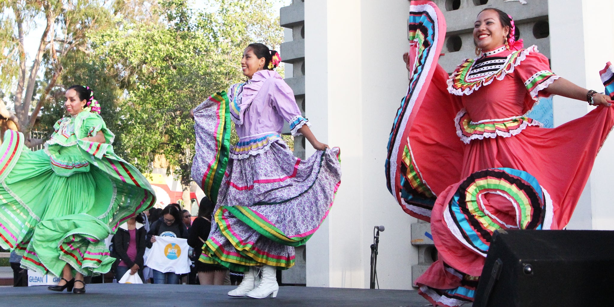 Ballet folklorico dancers perform at a campus event.