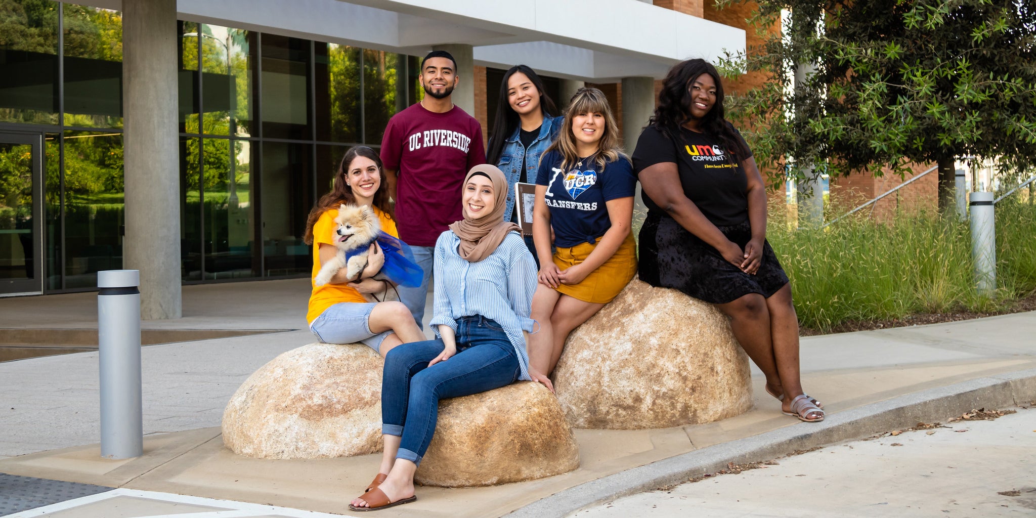 A group of UCR students pose in front of the Multidisciplinary Research Building, one of the newest buildings on campus.